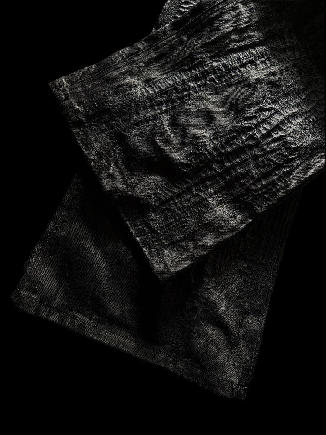 SERONINE CTX-55 Wax-Coated Structural Black Jeans - hem and coated texture detail
