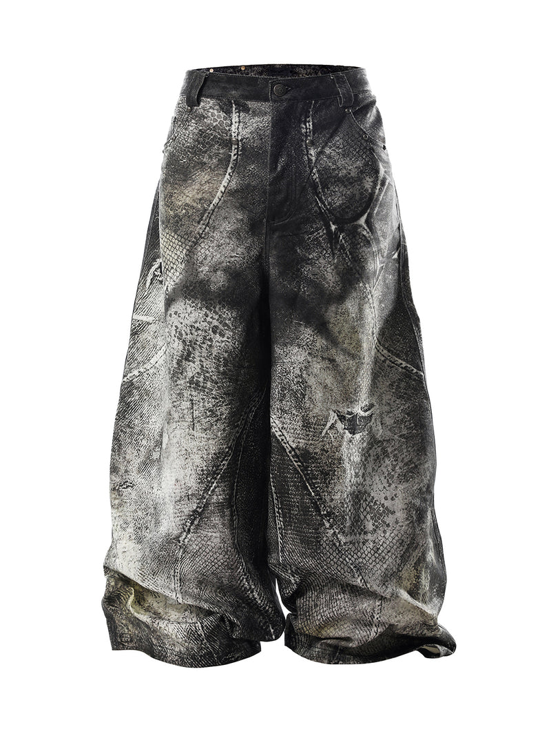 SER-MIM1 Failed Mimicry Lowerform washed black denim pants with misregistered snakeskin texture and hand-applied wax brushing by SERONINE.