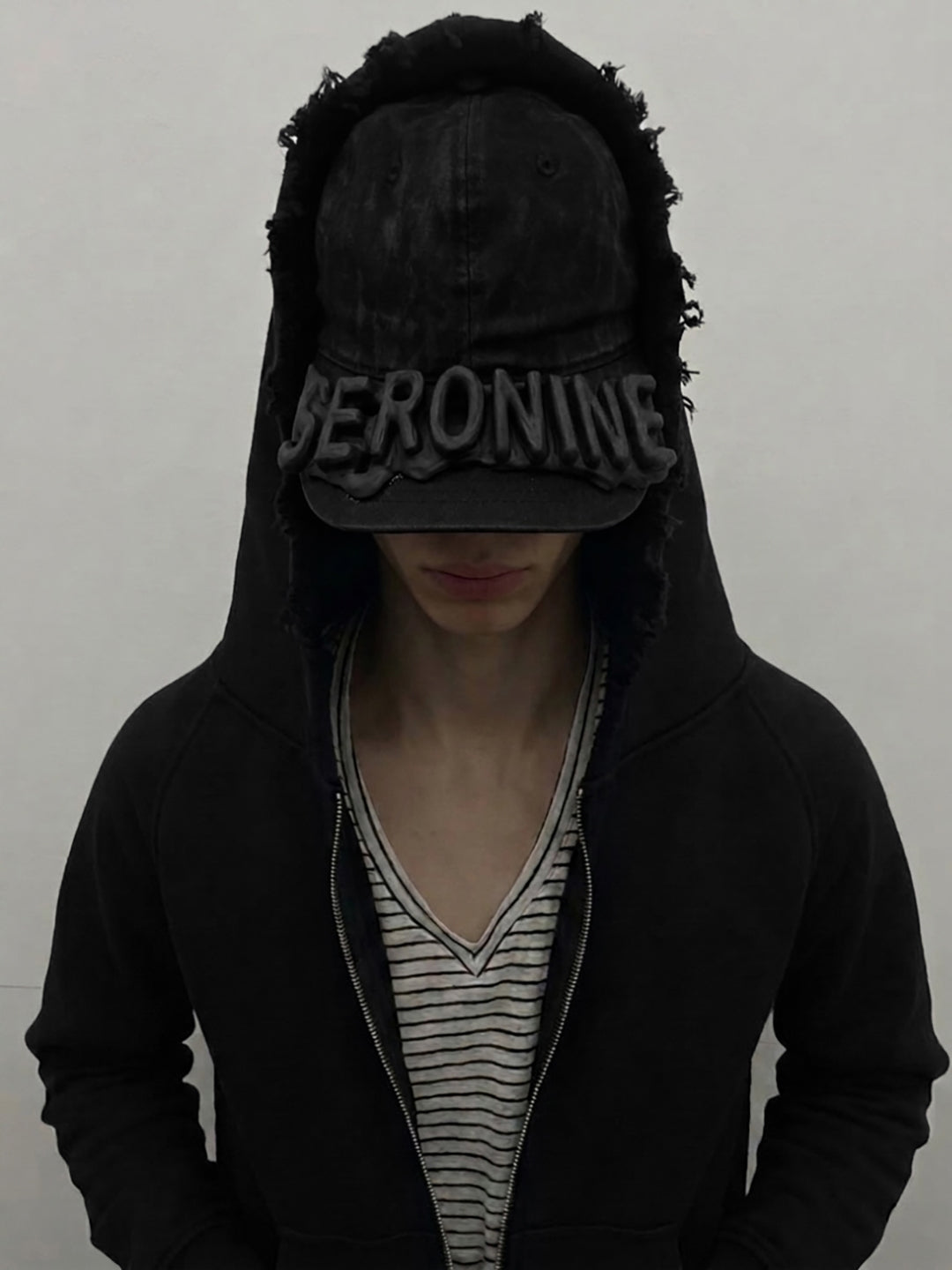 SERONINE CTX-56 Wax-Coated SLA 3D Logo Curved-Brim Cap - front styling with hood
