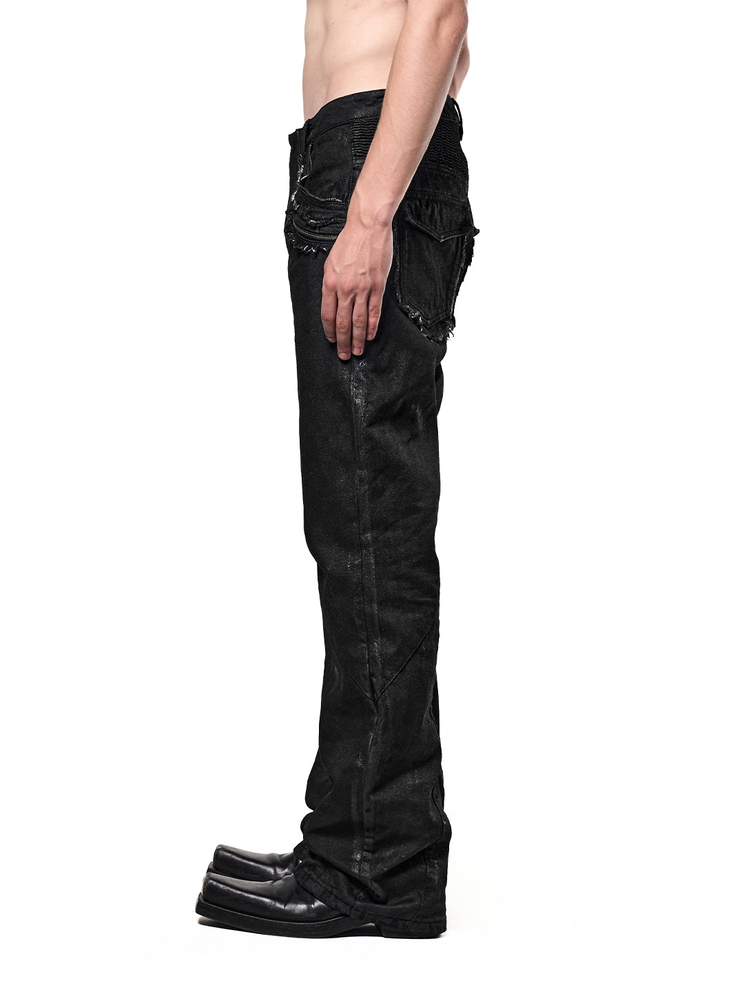 SERONINE CTX-54 Wax-Coated Frayed-Edge Zip Denim Pants - side fit on model