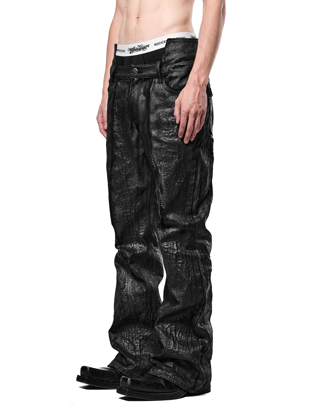 SERONINE CTX-55 Wax-Coated Structural Black Jeans - angled side fit on model