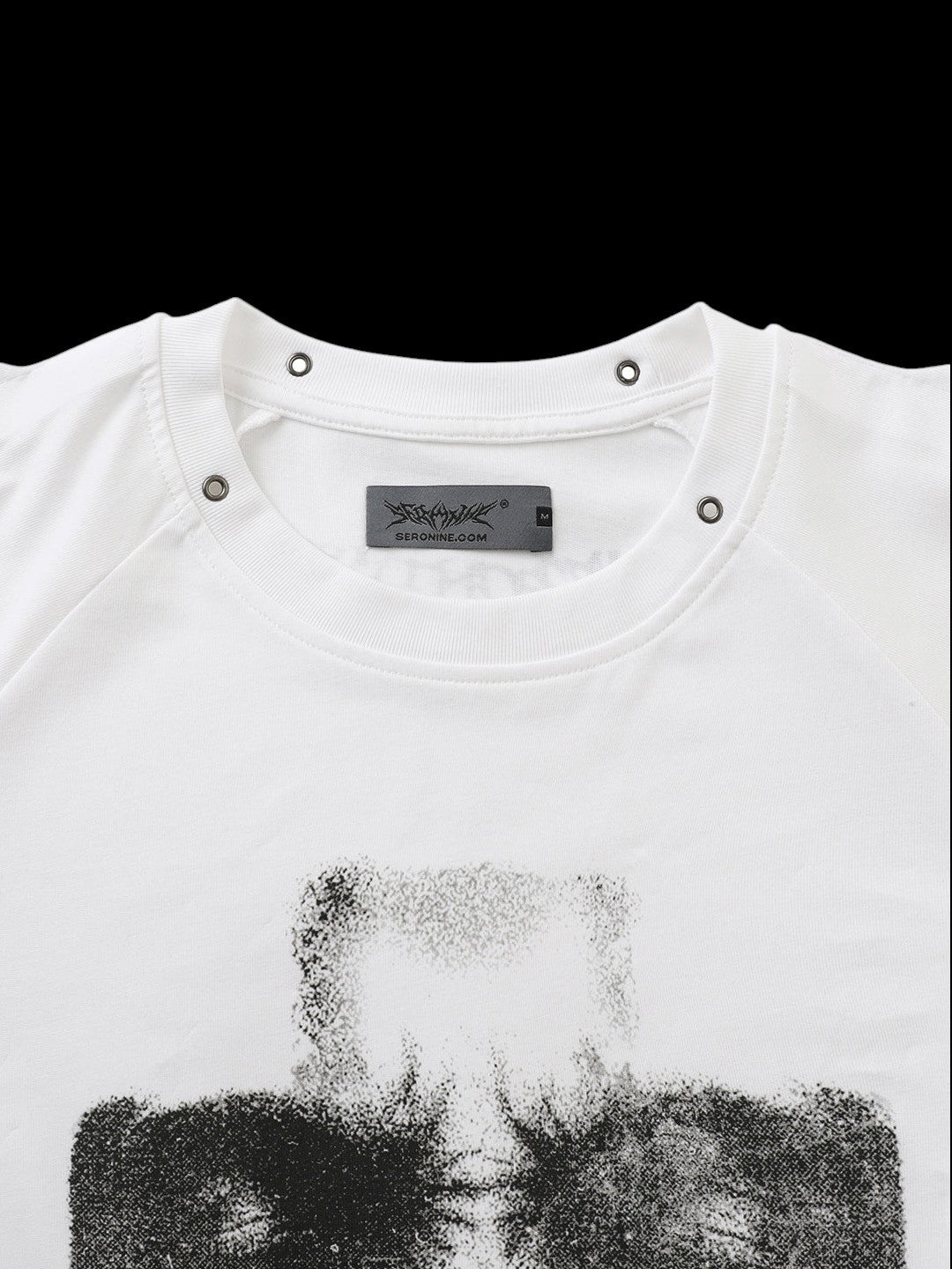 SERONINE SER-GUIL Spinal Guilt Spiked Graphic Tee - front neckline and label detail