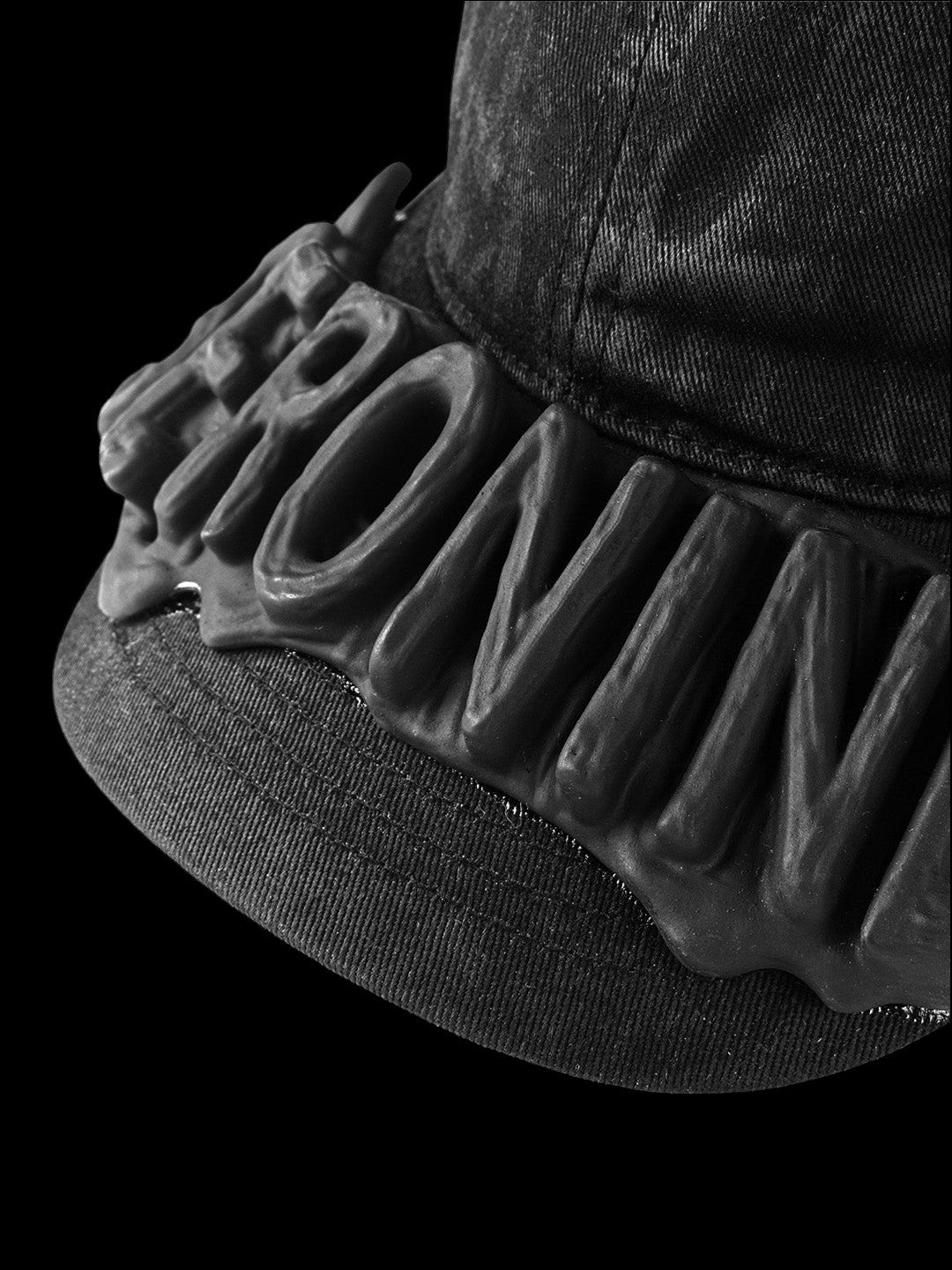 SERONINE CTX-56 Wax-Coated SLA 3D Logo Curved-Brim Cap - raised logo and brim close-up
