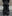 SERONINE VAR-46 Black Wax-Crack Distressed Wide-Leg Jeans - back full-length fit on model
