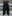 SERONINE VAR-47 Black Wax-Brushed Layered Wide-Leg Jeans - front fit with cargo pockets