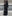 SERONINE VAR-47 Black Wax-Brushed Layered Wide-Leg Jeans - side fit and layered panel